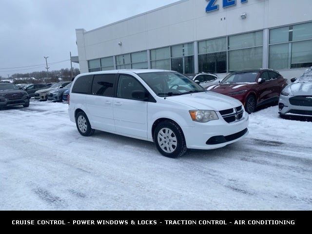 Used 2014 Dodge Grand Caravan SE with VIN 2C4RDGBG2ER262873 for sale in Lowell, MI